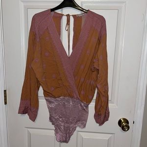 Beautiful bohemian flowy bodysuit! Orangey and light pinkish purple. NWT